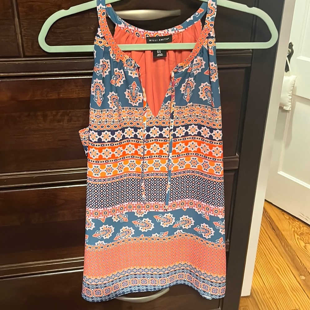 Orange and blue pattern sleeveless blouse. Size M